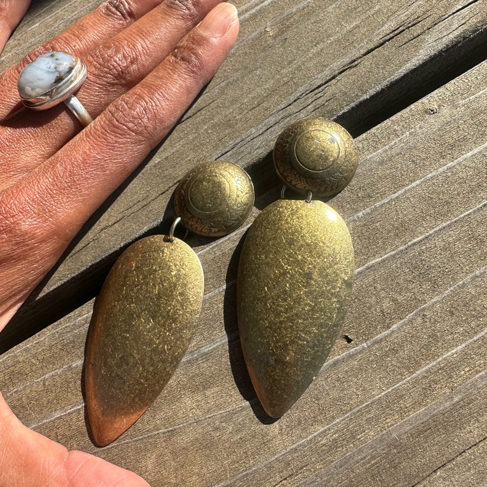Large brass tone earrings